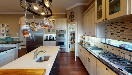 white ceramic sink with stainless steel faucet