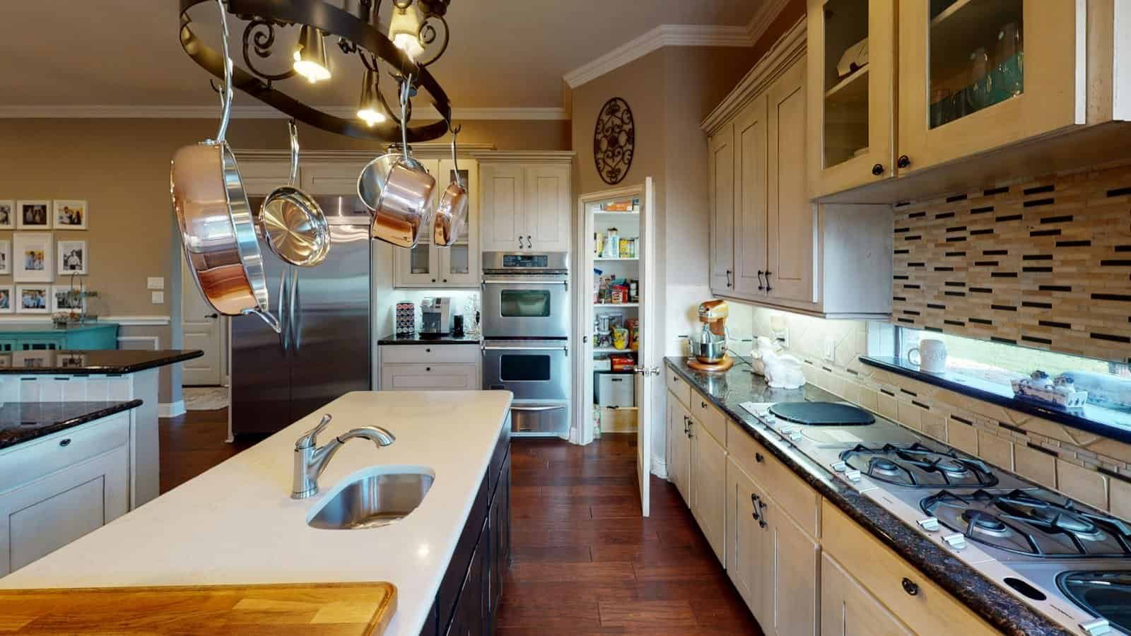 white ceramic sink with stainless steel faucet